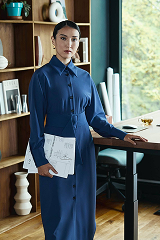 Person standing by bookshelf